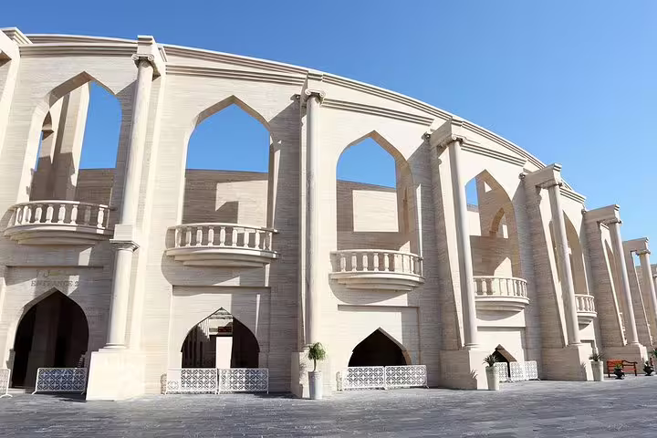 View of the iconic Katara Amphitheatre in Doha showcasing intricate Islamic architectural design.