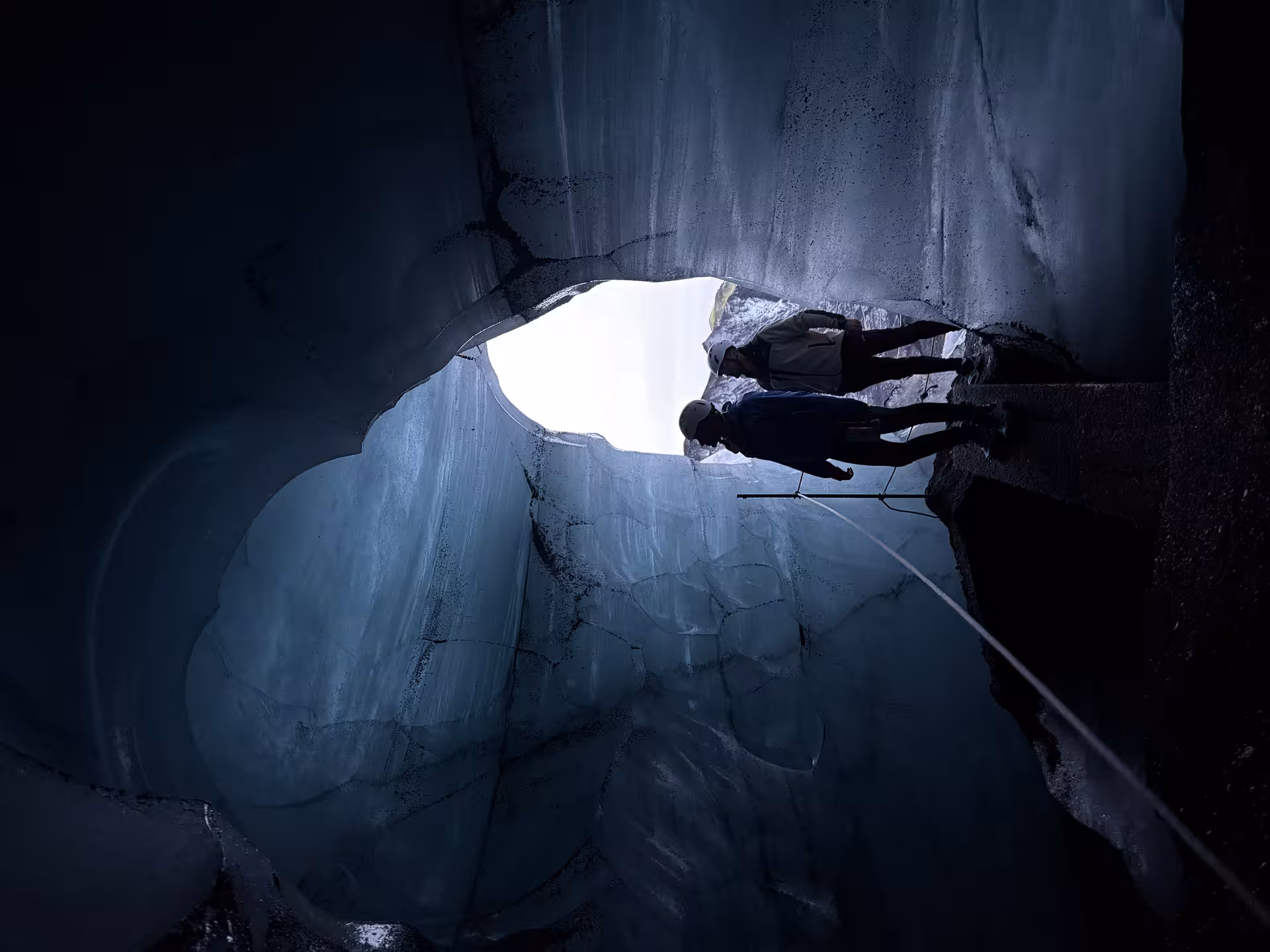 Helmets and headlamps inside Katla ice cave, Iceland, on private guided tour through blue glacier tunnel