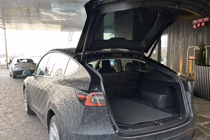 Spacious SUV with open trunk ready for Keflavik Airport private transfer to Reykjavik.