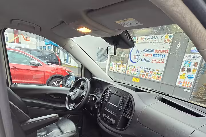 Comfortable interior of a premium transfer vehicle at Keflavik Airport, offering private transport to Reykjavik.