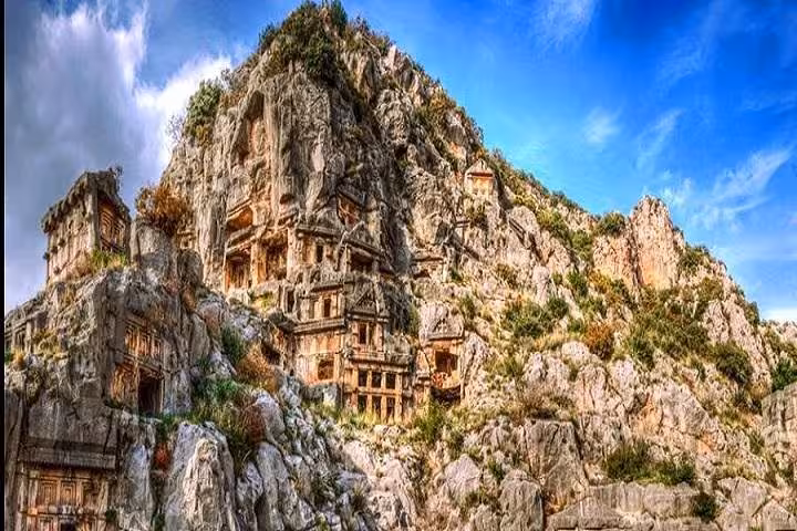 Ancient Lycian rock tombs near Myra, cultural stop on Kekova boat tour with St Nicholas Church