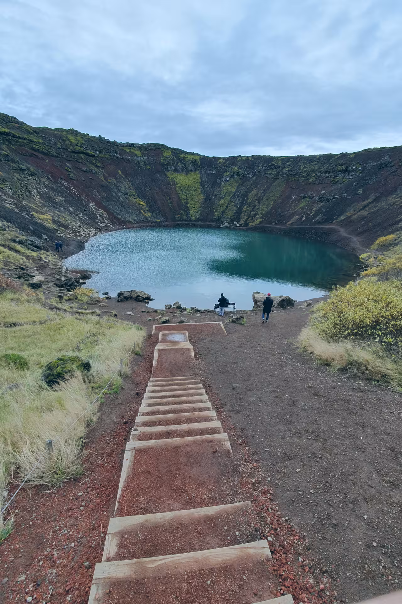 Kerid Crater Lake viewpoint with steps and hikers on a Private Golden Circle Tour Iceland day trip