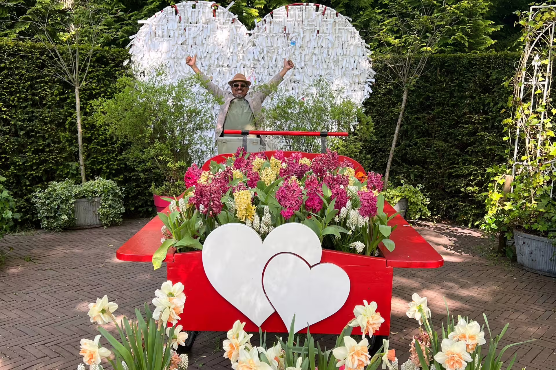 Keukenhof Gardens spring flowers and heart display, perfect photo stop on Amsterdam Keukenhof and Giethoorn tour