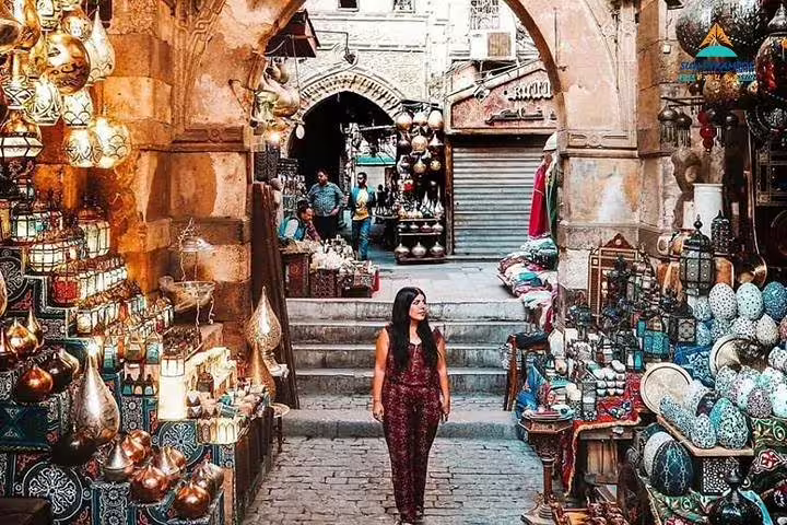 Khan El Khalili bazaar in Cairo with lanterns and souvenirs, visited on Luxor to Cairo flight day trip