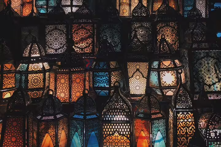 Colorful Egyptian mosaic lanterns hanging in Khan El Khalili bazaar, Old Cairo, on a Giza day tour