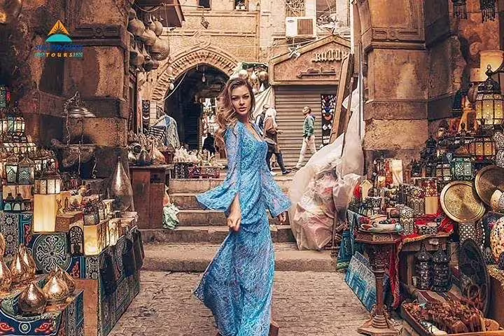 Woman shopping in Khan El Khalili market, Cairo highlights on a day tour from Luxor by flight, Egypt