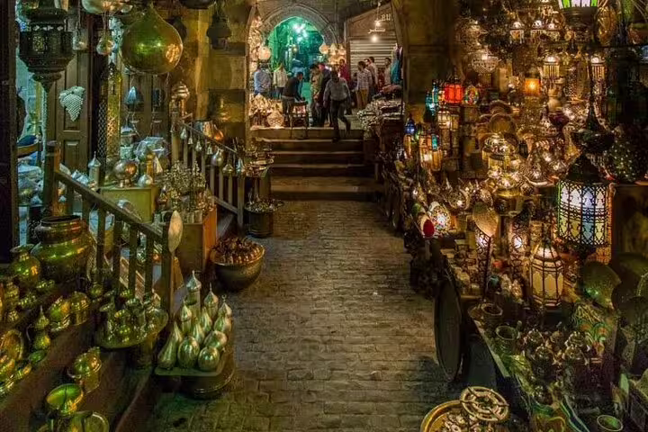 Cairo Khan El Khalili market corridor glowing with lanterns, a highlight of Port Said day tour itinerary