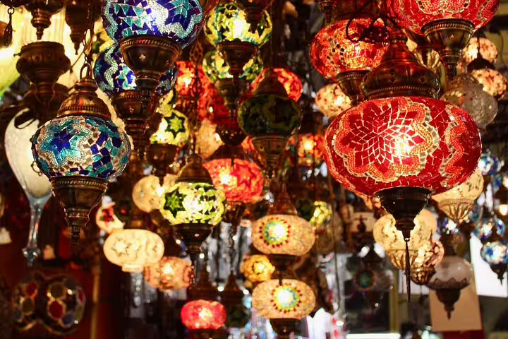 Close-up of hanging mosaic glass lanterns in Khan el-Khalili bazaar, highlight of a Medieval Cairo tour