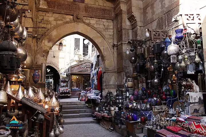 Khan El Khalili Bazaar alley on El-Moez Street Cairo, packed with brass lanterns and souvenirs