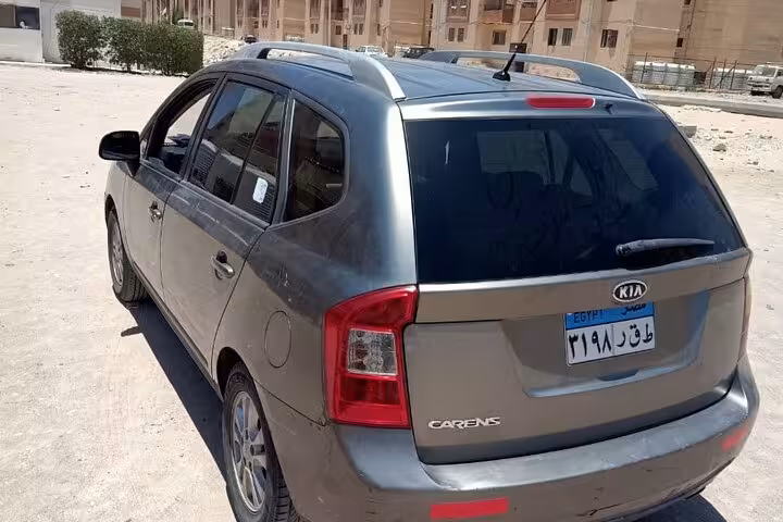 Kia Carens minivan ready for Hurghada to Marsa Alam airport transfer, ideal for families and luggage