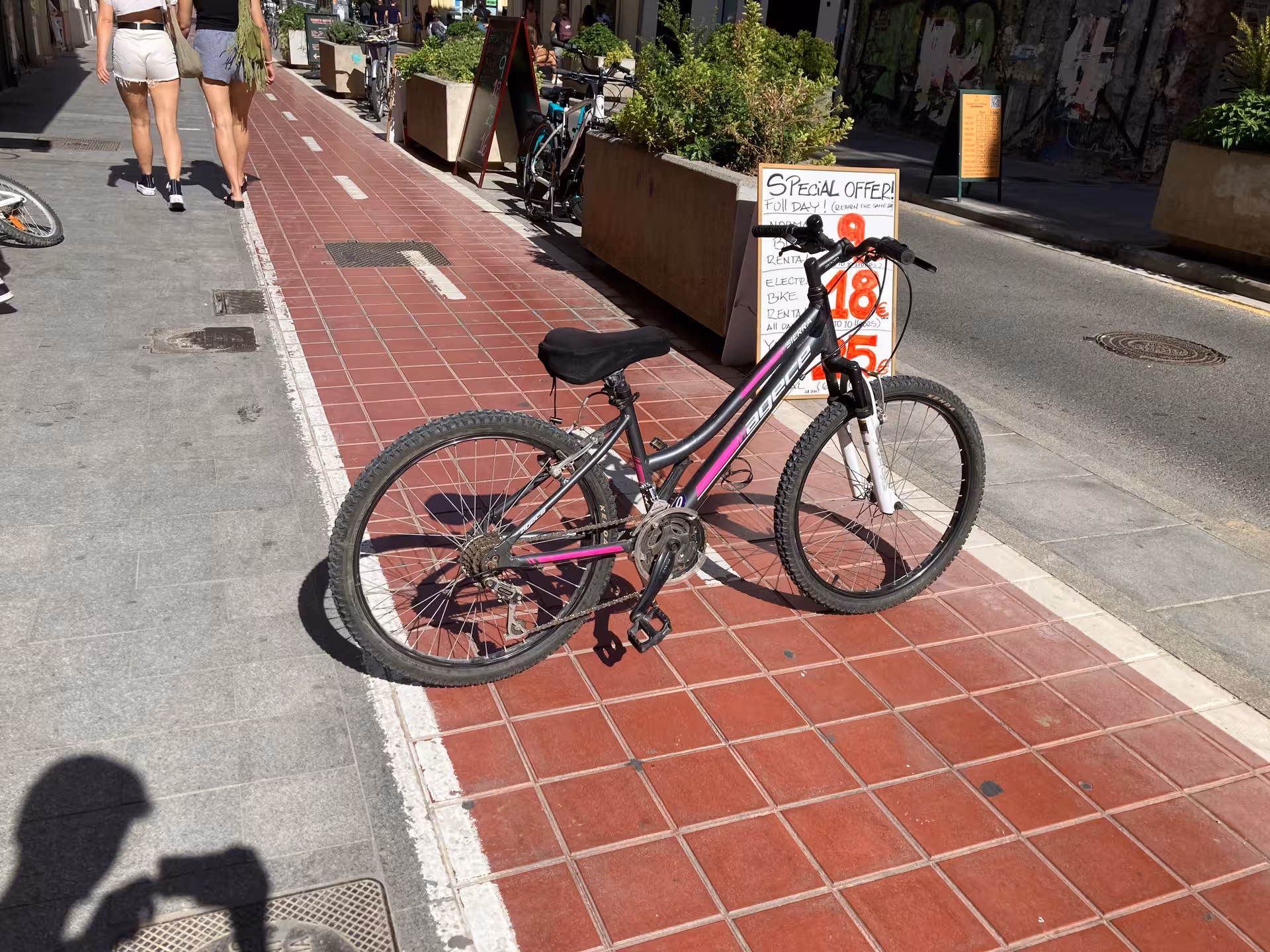 Kids city bike rental mountain-style bicycle on urban bike lane, perfect for family sightseeing by bike