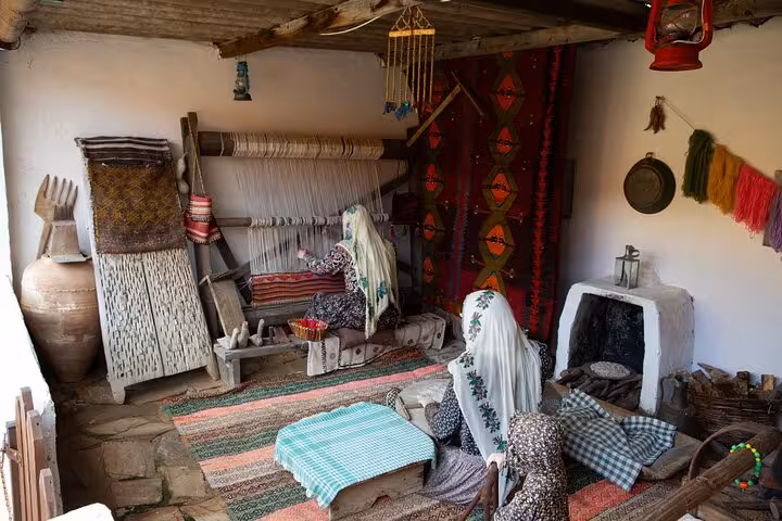 Traditional Turkish weaving room exhibit visited on kids Ephesus shore excursion from Kusadasi Port, cultural stop