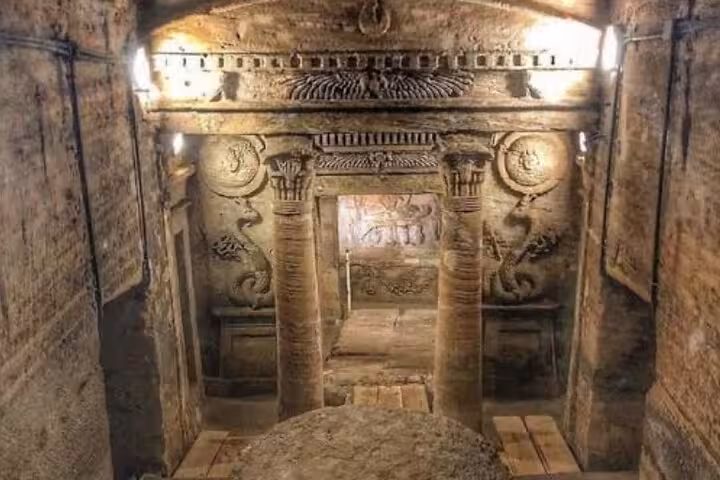 Kom El Shoqafa Catacombs chamber in Alexandria, Egypt, on a private day tour from Cairo with guide