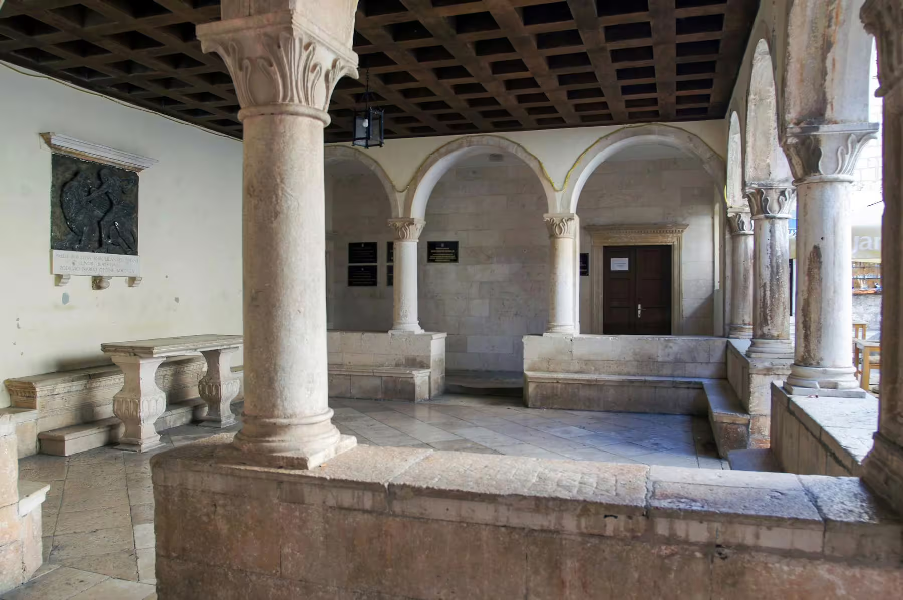 Historic Korcula cloister arches and columns visited on Legends of Peljesac & Korcula tour from Dubrovnik