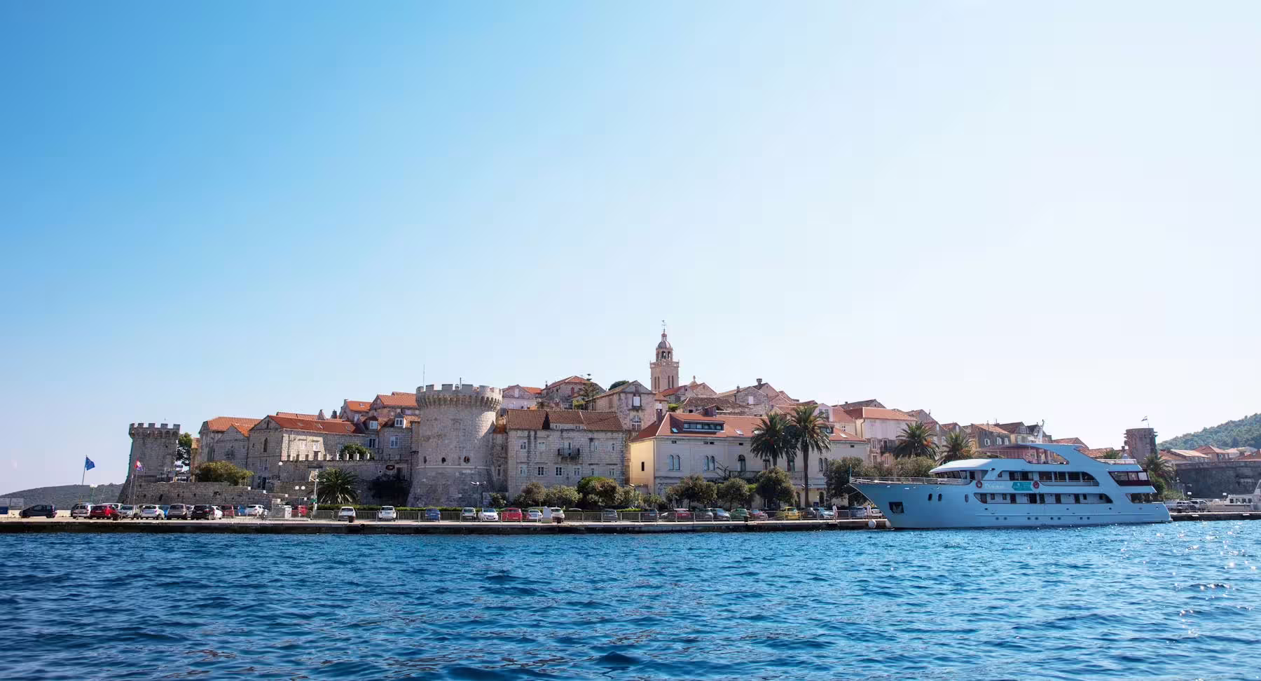 Korcula Old Town waterfront and yacht view on Legends of Peljesac & Korcula day tour from Dubrovnik