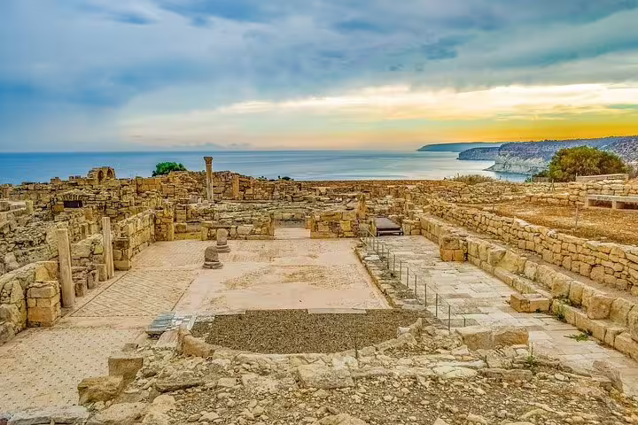 Ancient Kourion archaeological site overlooking the sea at sunset, highlight of a Southern Cyprus tour from Larnaca