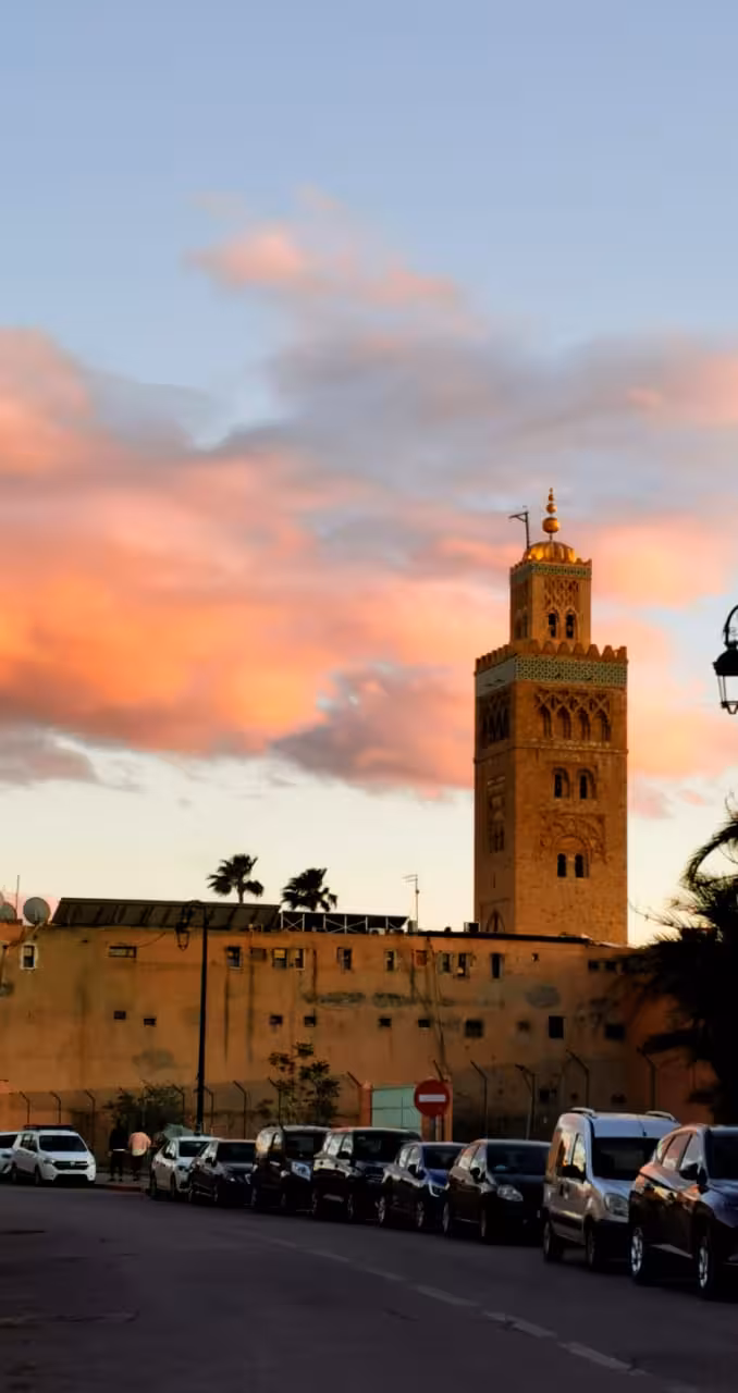 Koutoubia Mosque minaret at sunset in Marrakech, iconic landmark on Best of Morocco guided tour