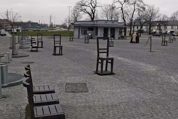 Empty chairs memorial at Ghetto Heroes Square, Podgorze, visited on private half-day Krakow sightseeing