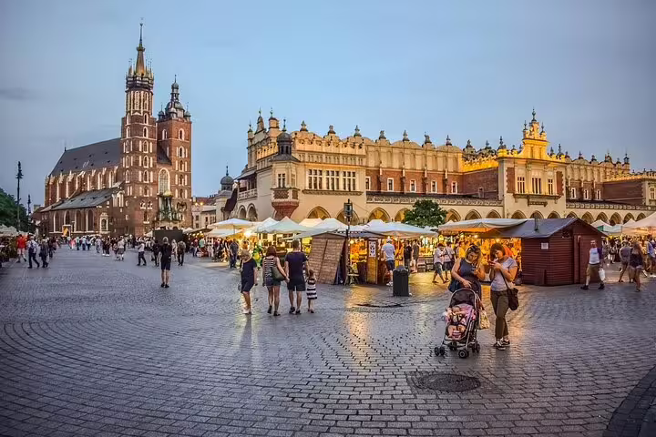 Krakow Main Market Square with St Mary’s Basilica, lively scene on a self-paced e-scavenger hunt tour