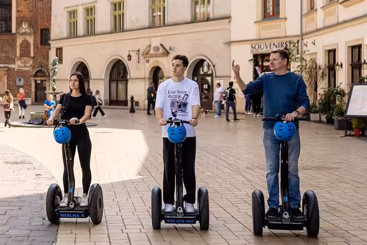 Participants on Krakow Segway tour exploring city landmarks and attractions.