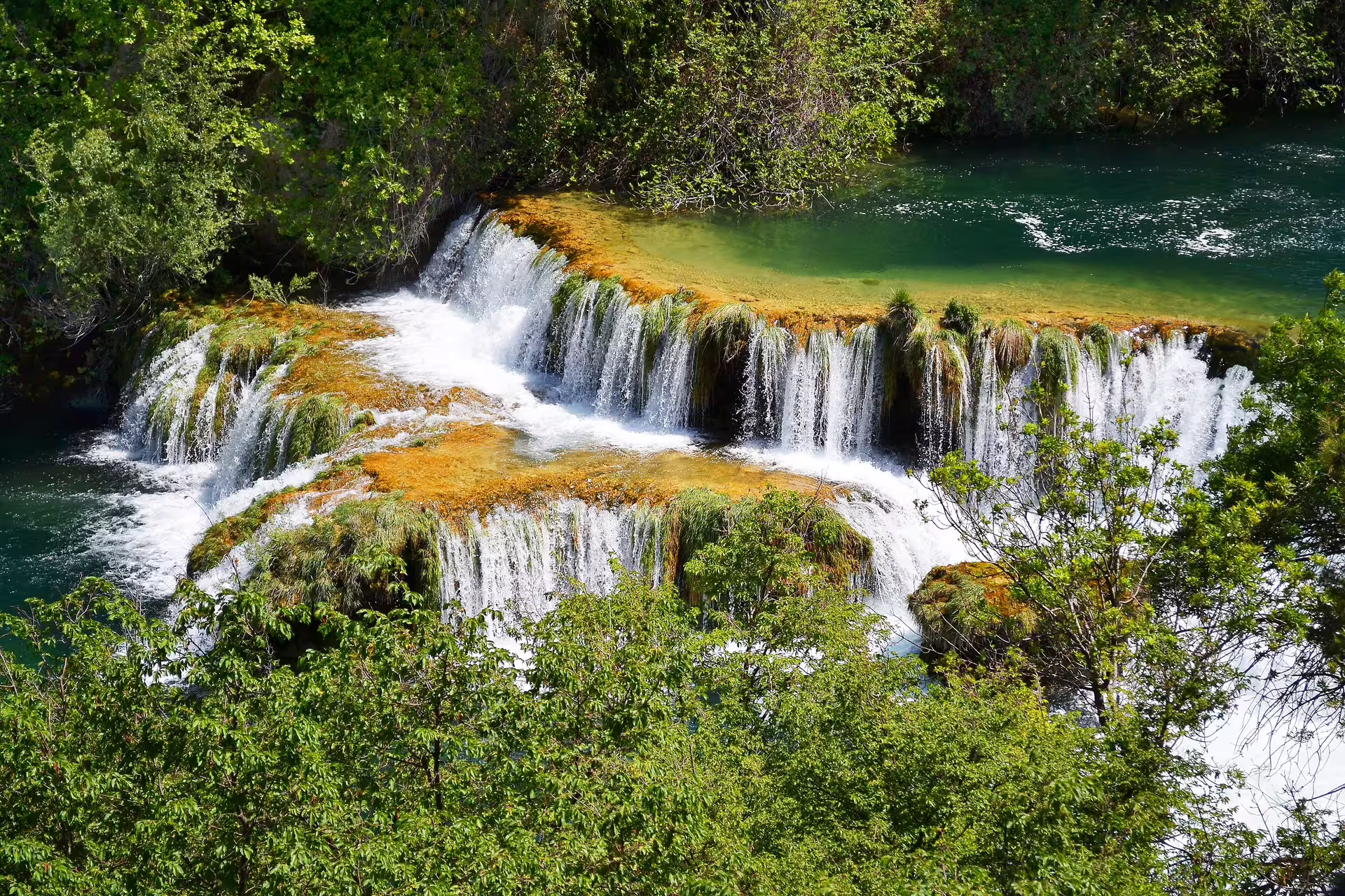 Krka National Park waterfalls and emerald pools, a scenic stop on Croatia Express self-drive itinerary