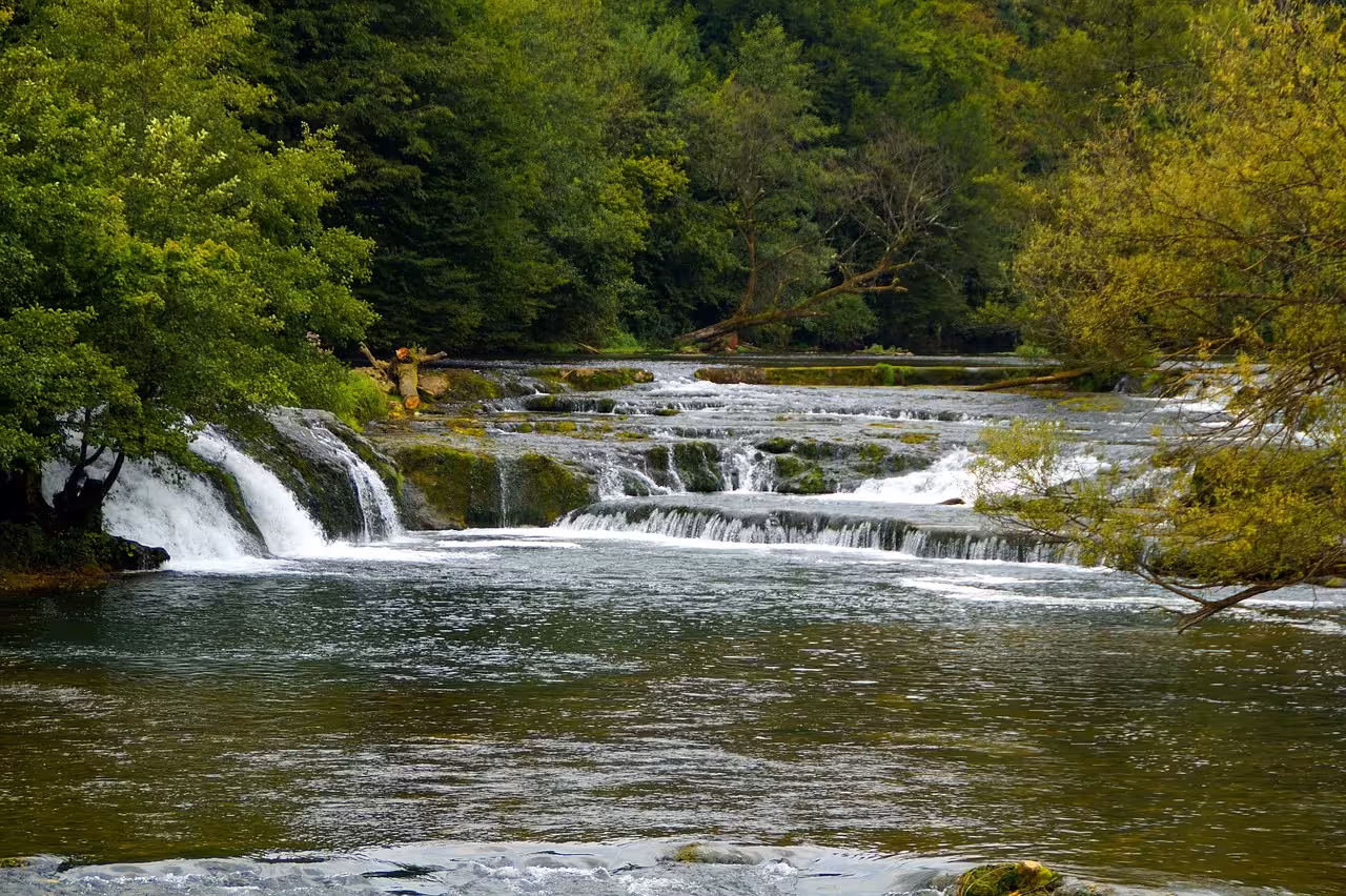 Tiered cascades on the Krka River in Krka National Park, scenic stop on the Skradin lake cruise tour
