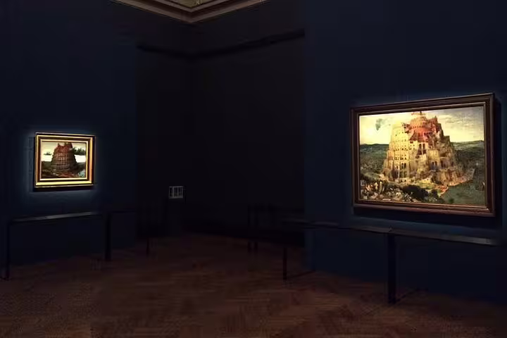 Dimly lit gallery room displaying iconic paintings at Kunsthistorisches Museum, perfect for a private tour.