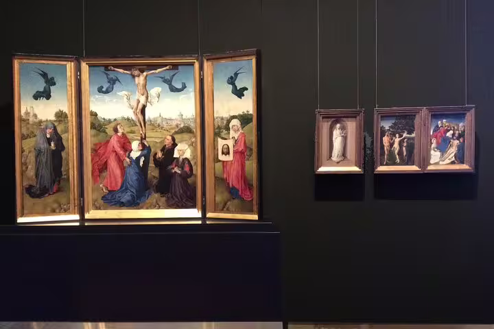 Triptych and paintings on display at the Kunsthistorisches Museum, offering a glimpse of its rich art collection.
