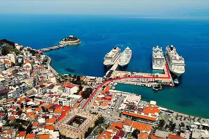 Aerial view of Kusadasi Port bustling with cruise ships, ideal starting point for horseback riding tours in Turkey.