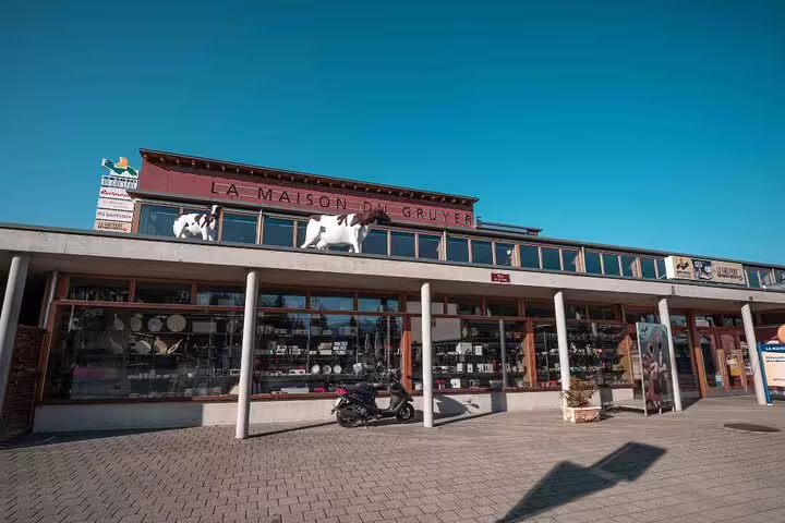 Exterior view of La Maison du Gruyère, a popular destination for cheese tasting on the Gruyères tour.