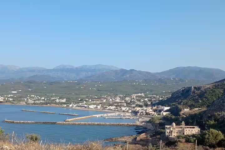 Panoramic view of the Lady of the Angels Monastery overlooking the coastline near Thousand Flowers Falasarna Beach.