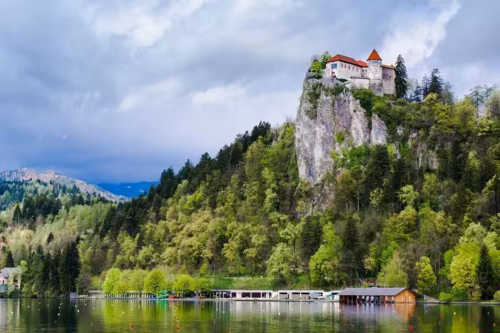 Lake Bled and cliff-top Bled Castle view, scenic stop on Budapest to Dubrovnik highlights tour route