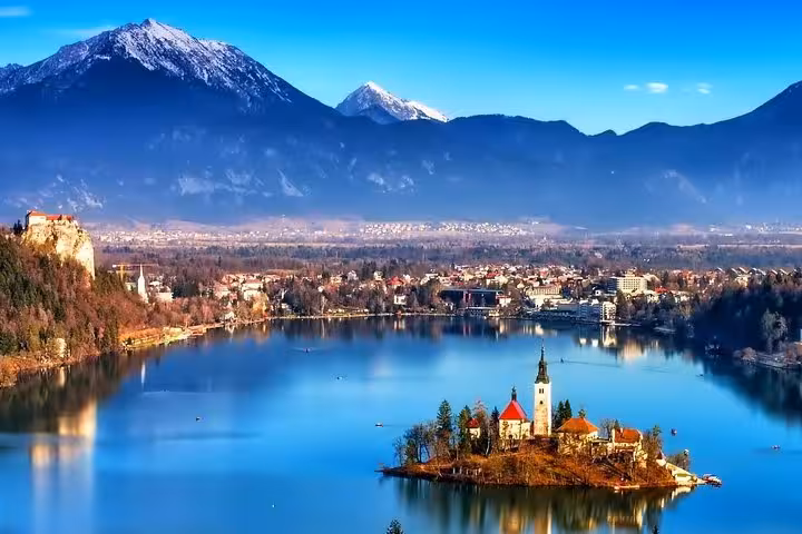 Lake Bled island church and castle with Julian Alps, Slovenia highlight on 8-day Balkans private tour