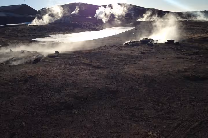 Steam rising from the geothermal landscape near Lake Myvatn, a scenic stop on the Akureyri port day tour.