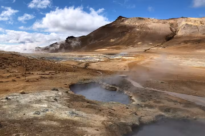Explore the geothermal wonders of Lake Myvatn on a private day tour with stunning volcanic landscapes.