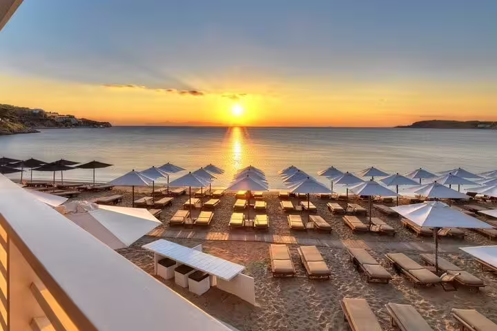 Sunset beach loungers on the Athenian Riviera, Athens summer day trip with seaside swim stop