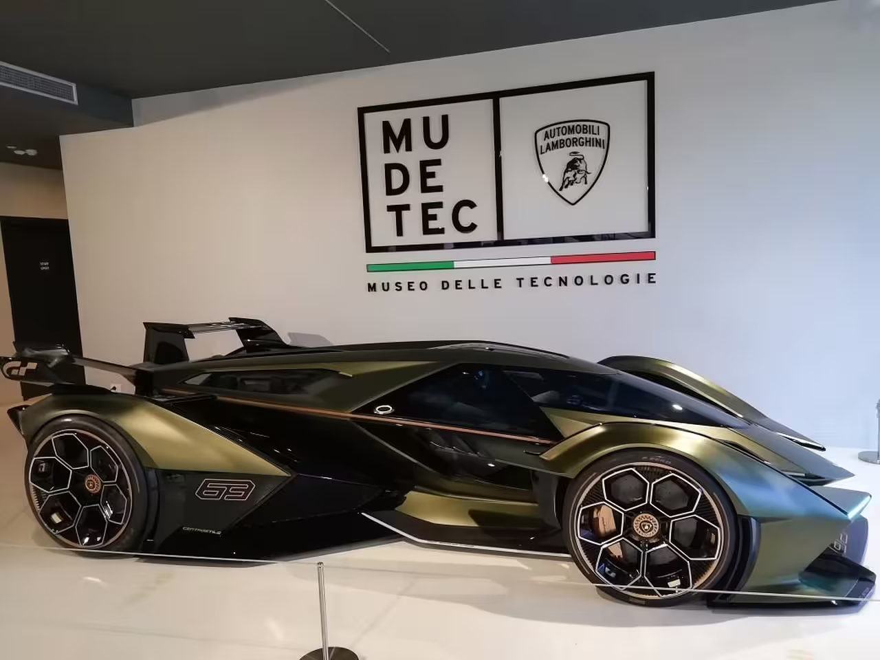 Striking Lamborghini concept car on display at the Lamborghini Museum in Bologna, showcasing cutting-edge design.