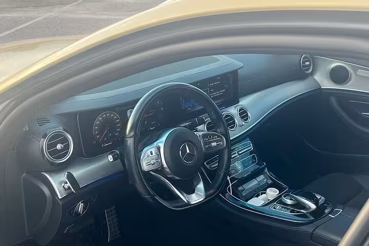 Premium sedan interior for Lavrio Port to Athens Airport private departure transfer with air-conditioned comfort