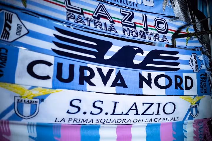 Lazio Curva Nord scarf display, part of local matchday experience tour to join a Lazio game in Rome