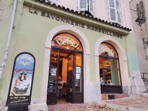 La Savonnerie Marseillaise storefront in Le Panier, Marseille, featuring traditional soap shop stop on walking tour