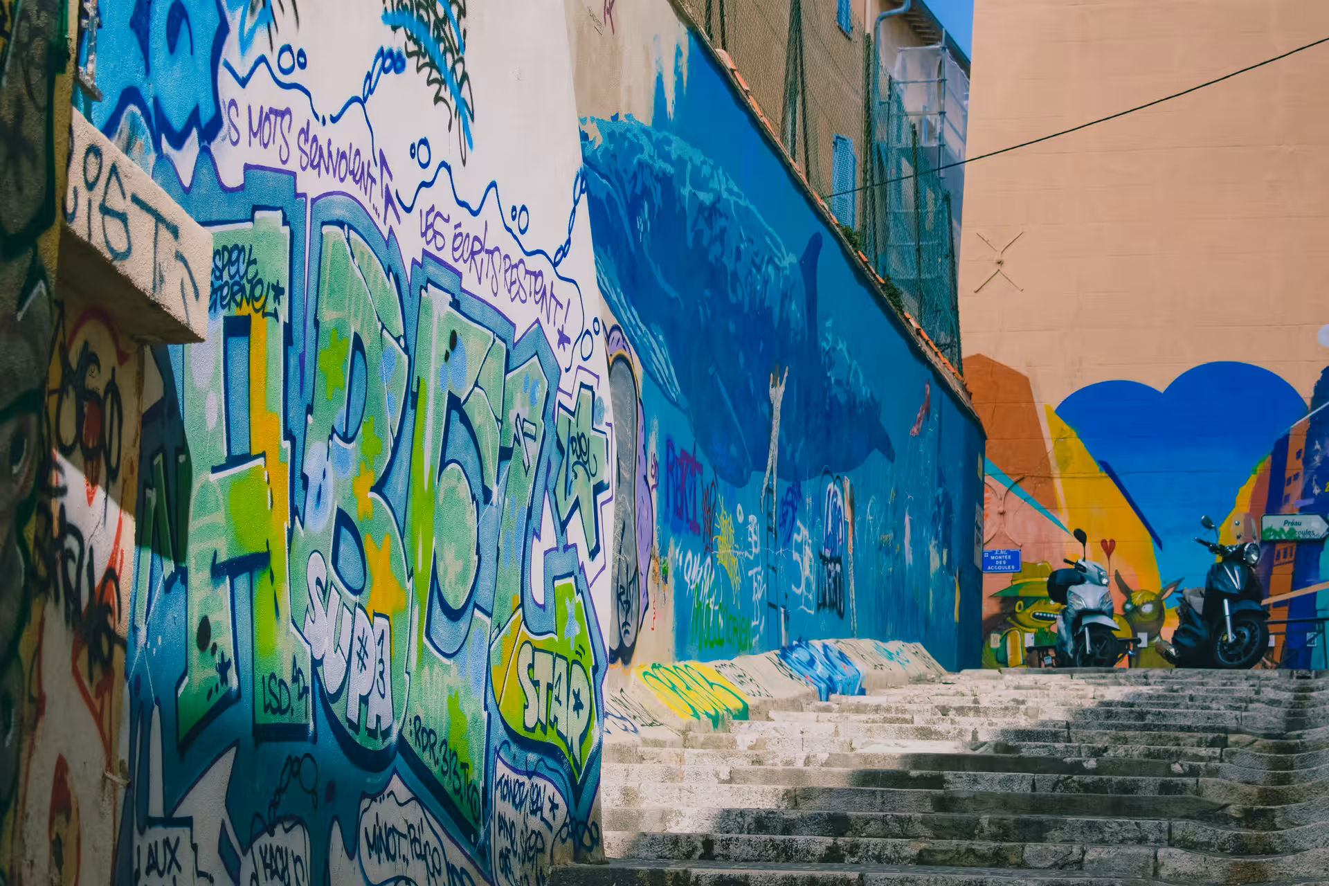 Colorful street art staircase in Le Panier, Marseille, on a guided walking tour of the oldest neighbourhood