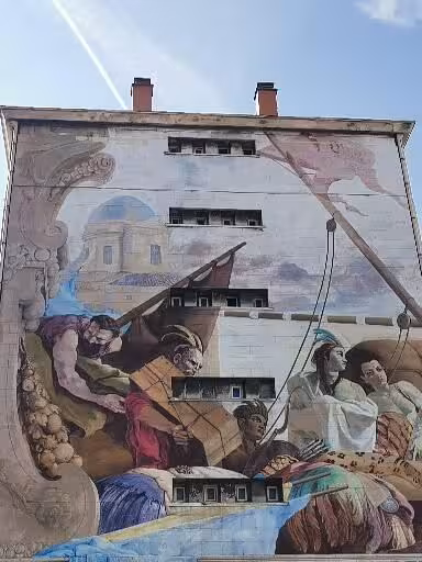 Giant street mural on a Le Panier building in Marseille, a highlight of the oldest neighbourhood walking tour