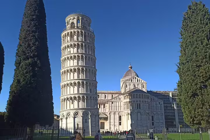 Leaning Tower of Pisa and Pisa Cathedral under clear blue sky on private shore excursion with Tuscan lunch and wine