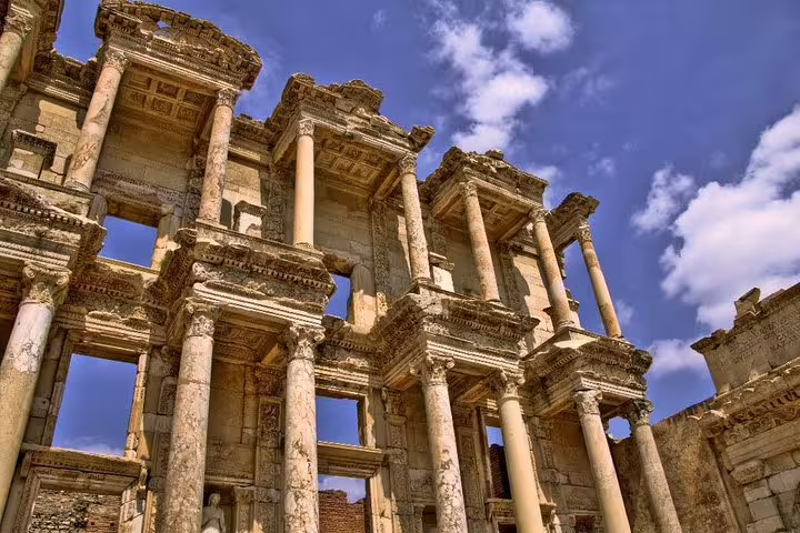 Close-up of the majestic columns of the Library of Celsus at Ephesus, showcasing its intricate ancient design.