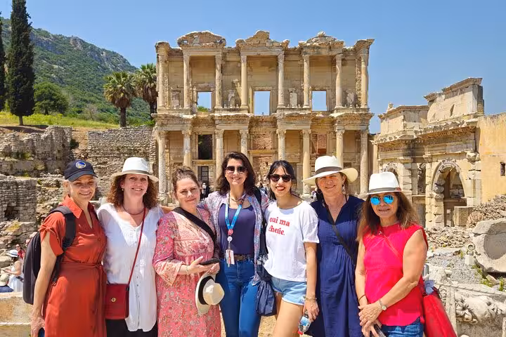 Travelers pose at the Library of Celsus in Ephesus, key sight on 8-day Cappadocia Pamukkale Antalya itinerary