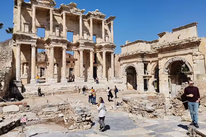 Library of Celsus in Ephesus with visitors, iconic stop on a 7-day guided Western Turkey mini group tour