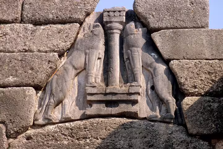 Lion Gate relief at Mycenae citadel, key stop on private half-day tour from Athens via Corinth Canal