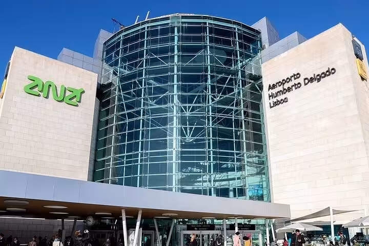 Exterior view of Lisbon's Humberto Delgado Airport, starting point for private Mercedes transfer to Algarve.
