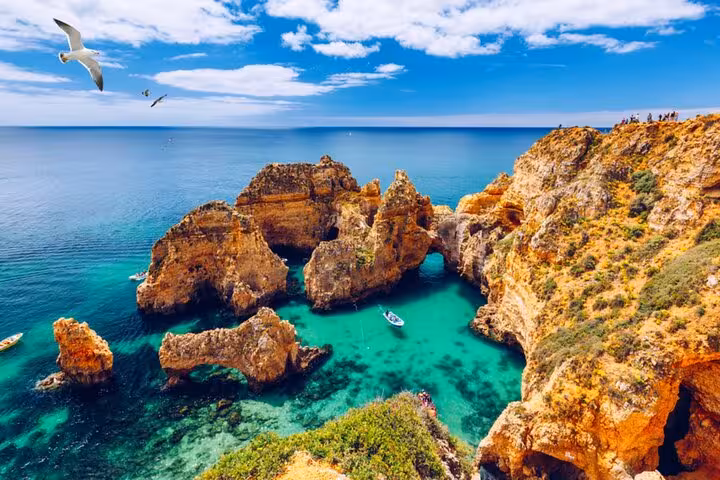 Breathtaking Ponta da Piedade rock formations in Algarve, ideal stop on Lisbon to Algarve private transfer.