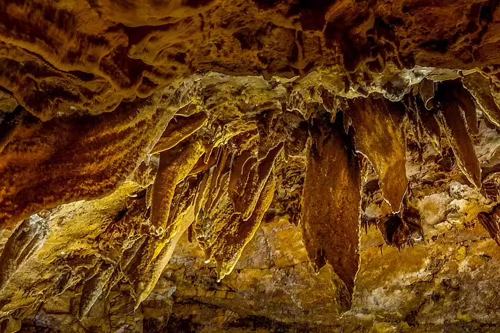 Stunning stalactites in Portugal's largest caves, featured in a full-day private tour from Lisbon to Fatima.